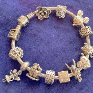 Authentic Pandora 7 inch Bracelet with charms
